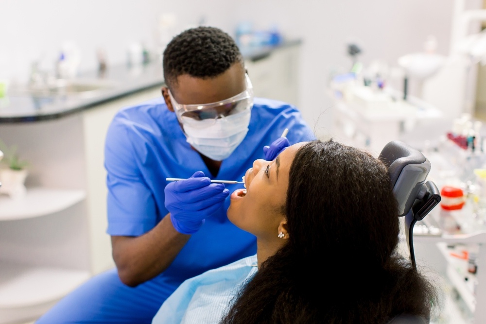 dentist cleaning teeth