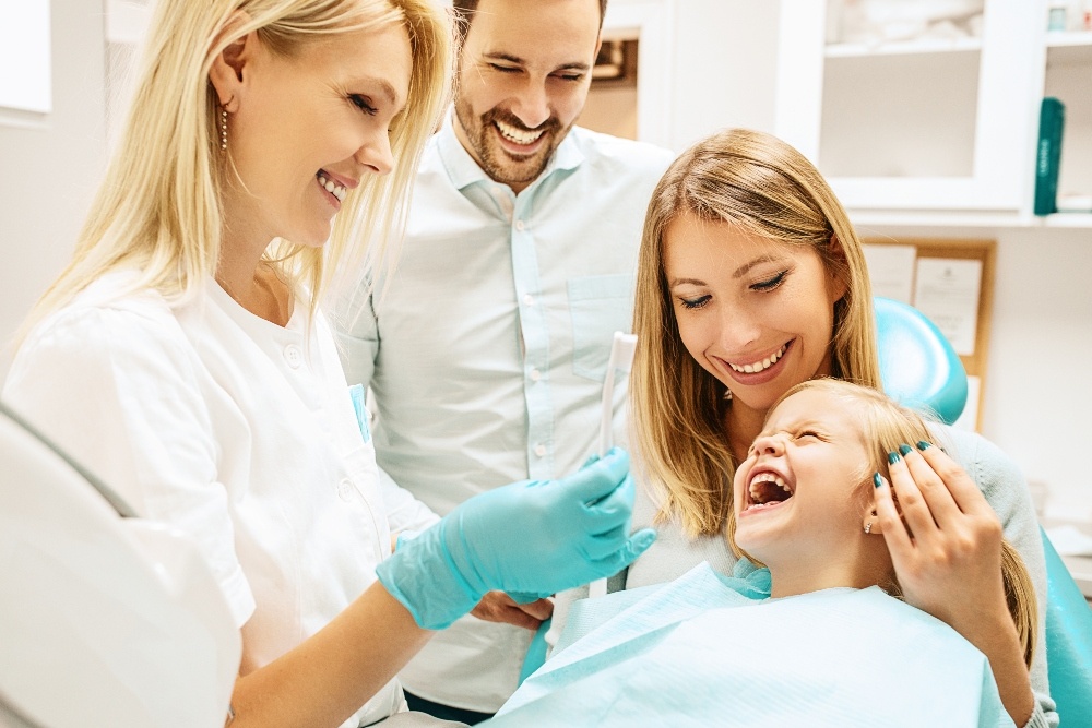 dentist interacting with patient